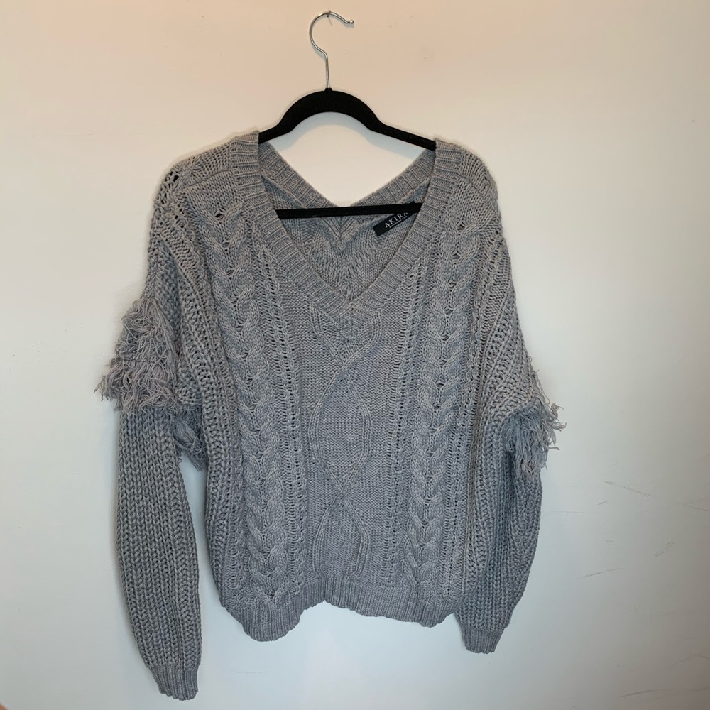 Gray knit sweater with fringe